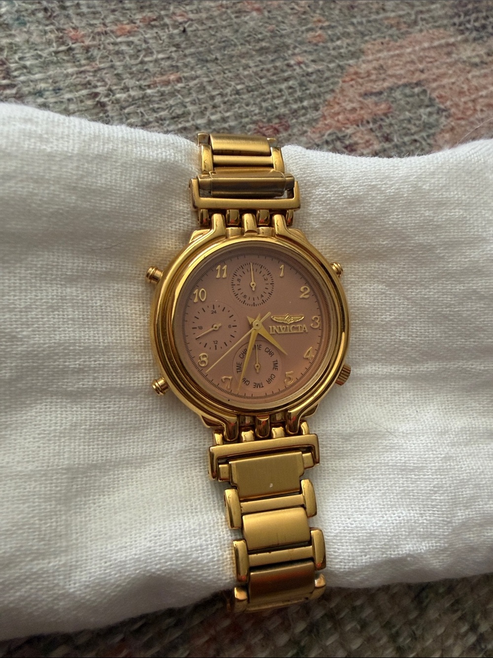 Invicta Gold-Tone Watch with Pink Dial and Bracelet Band